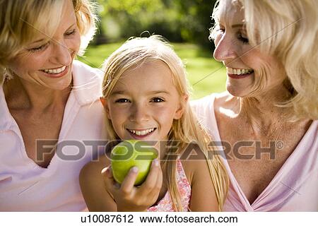 Grandmother, mother and daughter in park View Large Photo Image Stock Image - Grandmother, mother and daughter in park. Fotosearch