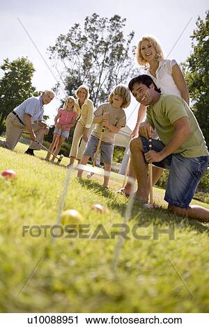 Grandparents and family in park View Large Photo Image Stock Image - Grandparents and family in park. Fotosearch