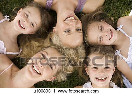 Stock Image - Two adults and three children. Fotosearch