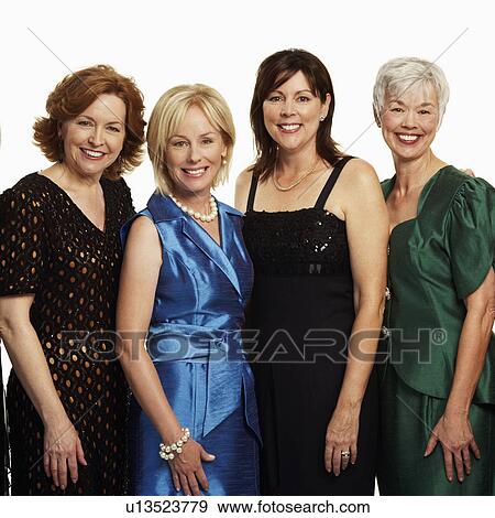 Stock Photo - Portrait of a group of mature women standing together and smiling. Fotosearch