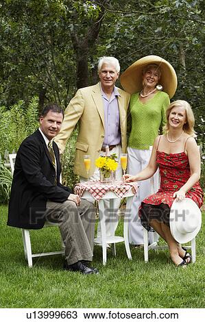 Portrait of a mature couple smiling with a mature man and a senior woman View Large Photo Image Stock Image - Portrait of a mature couple smiling with a mature man and a senior woman. Fotosearch