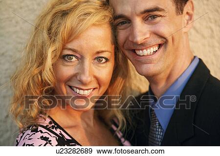 Stock Photo - Portrait of a mature couple smiling. Fotosearch