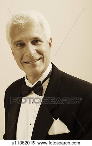Stock Photography - Portrait of a mature man smiling. Fotosearch