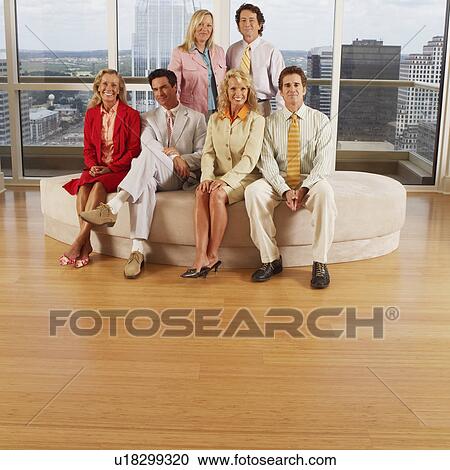 Portrait of three businessmen and three businesswomen smiling View Large Photo Image Stock Image - Portrait of three businessmen and three businesswomen smiling. Fotosearch