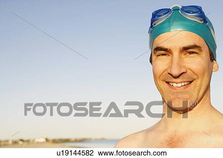 Stock Image - Portrait of a mature man smiling. Fotosearch