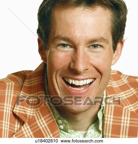 Stock Image - Portrait of a mid adult man laughing. Fotosearch