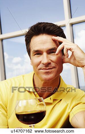 Portrait of a mature man grinning View Large Photo Image Stock Image - Portrait of a mature man grinning. Fotosearch