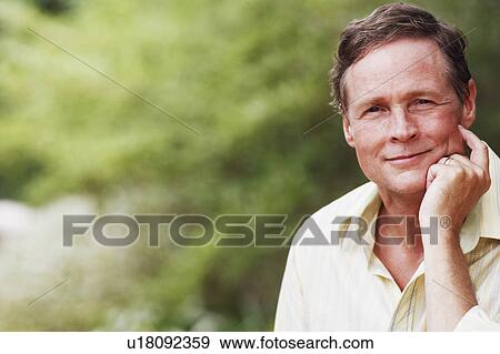 Portrait of a mature man thinking View Large Photo Image Stock Photo - Portrait of a mature man thinking. Fotosearch