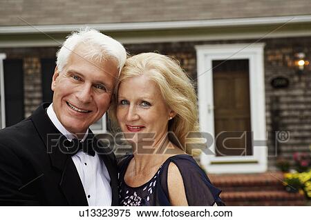 Stock Photography - Portrait of a mature couple smiling. Fotosearch