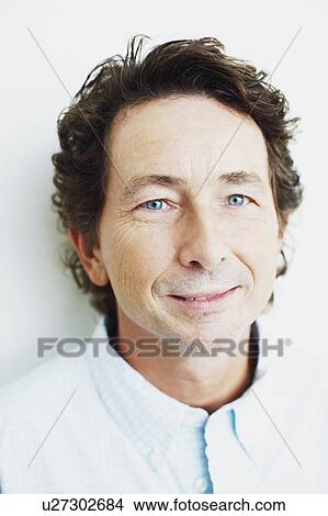 Portrait of a mature man grinning View Large Photo Image Picture - Portrait of a mature man grinning. Fotosearch