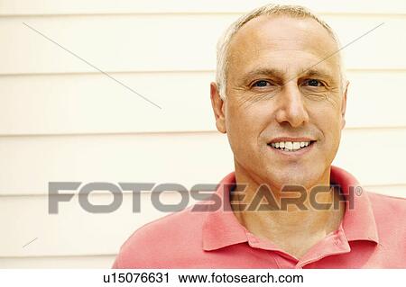 Stock Image - Portrait of a mature man smiling. Fotosearch