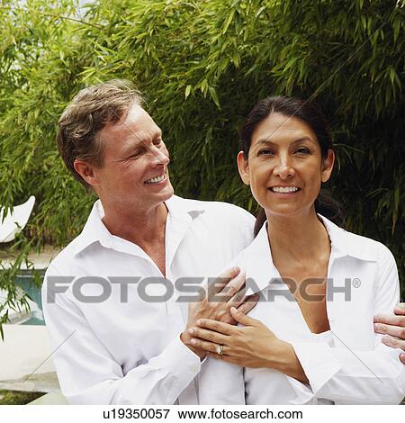 Stock Photo - Mature couple standing together. Fotosearch