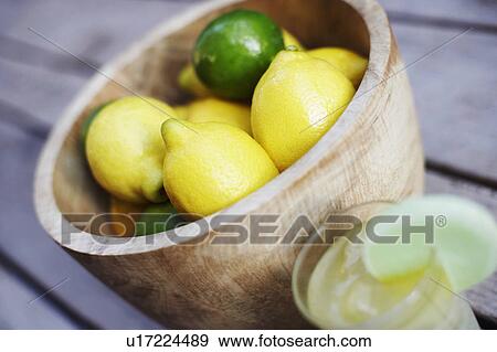 Stock Photo - Close-up of lemons in a bowl. Fotosearch