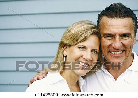 Stock Photo - Portrait of a mature couple smiling. Fotosearch