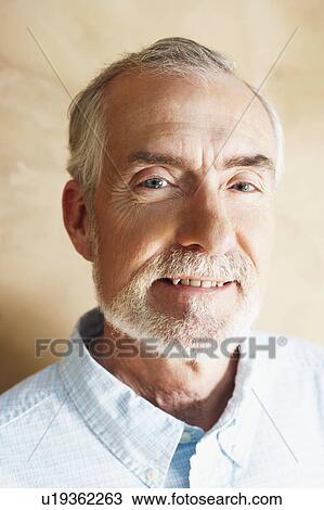 Stock Image - Portrait of a mature man smiling. Fotosearch