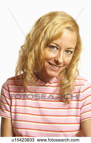 Portrait of a mature woman smiling View Large Photo Image Stock Image - Portrait of a mature woman smiling. Fotosearch