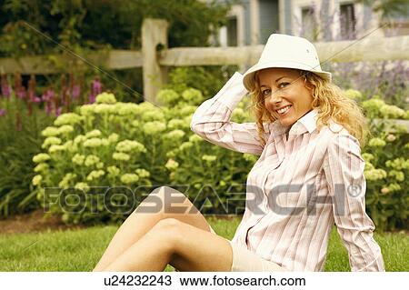 Stock Image - Portrait of a mature woman smiling. Fotosearch