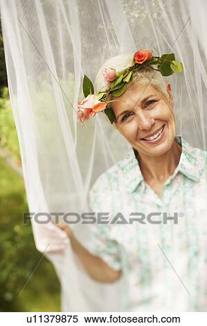 Portrait of a senior woman smiling View Large Photo Image Stock Photography - Portrait of a senior woman smiling. Fotosearch