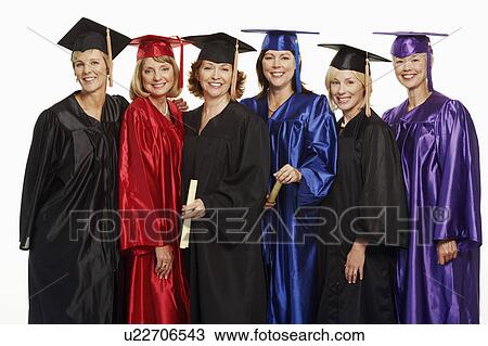 Portrait of a group of mature women wearing graduation gowns View Large Photo Image Stock Image - Portrait of a group of mature women wearing graduation gowns. Fotosearch