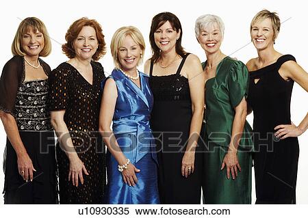 Portrait of a group of mature women standing together and smiling View Large Photo Image Stock Photography - Portrait of a group of mature women standing together and smiling. Fotosearch