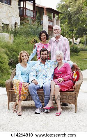 Stock Image - Portrait of a group of people smiling. Fotosearch