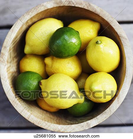 Stock Photography - Close-up of lemons in a bowl. Fotosearch