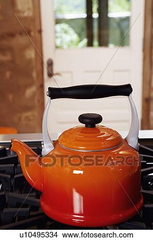 Picture - Close-up of a kettle on a stove. Fotosearch