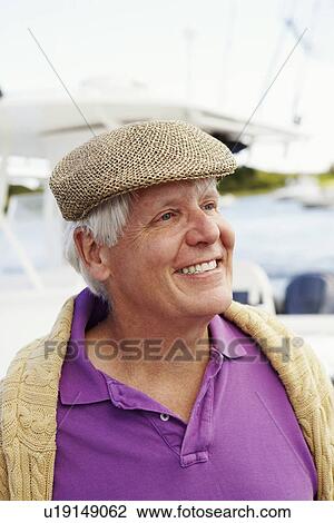 Stock Image - Close-up of a mature man smiling. Fotosearch