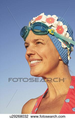 Stock Image - Close-up of a mature woman smiling. Fotosearch