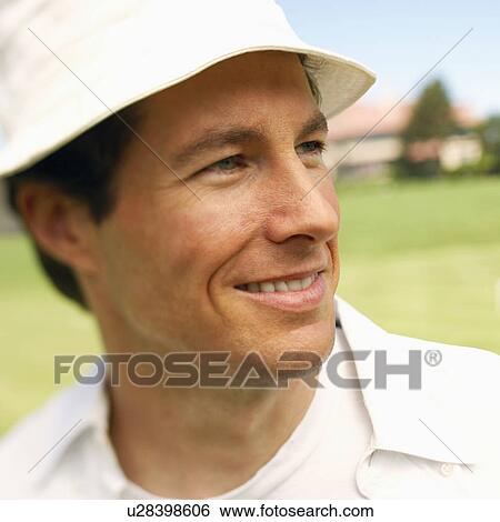 Close-up of a mid adult man smiling View Large Photo Image Stock Photograph - Close-up of a mid adult man smiling. Fotosearch