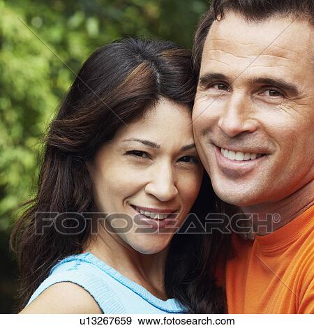 Stock Photo - Portrait of a mature couple smiling. Fotosearch