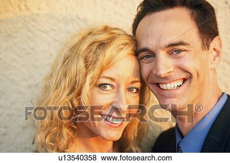 Stock Photo - Portrait of a mature couple smiling. Fotosearch