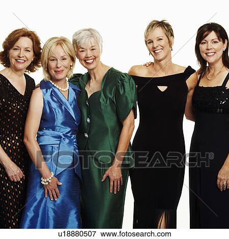 Portrait of a group of mature women standing together and smiling View Large Photo Image Stock Photo - Portrait of a group of mature women standing together and smiling. Fotosearch