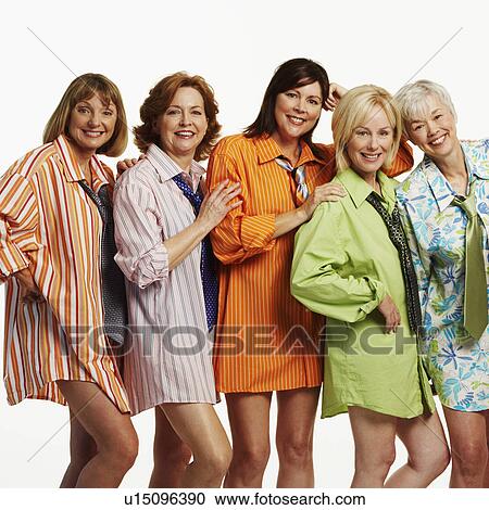 Stock Image - Portrait of five mature women standing together and smiling. Fotosearch
