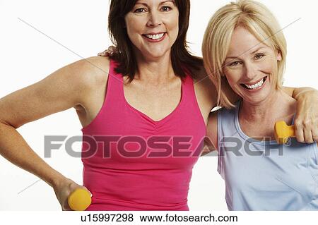Portrait of two mature women smiling View Large Photo Image Stock Photo - Portrait of two mature women smiling. Fotosearch