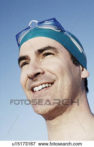 Stock Photo - Close-up of a mature man smiling. Fotosearch