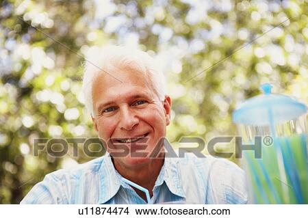 Picture - Portrait of a mature man smiling. Fotosearch