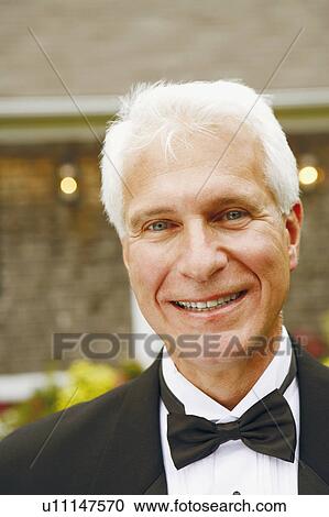 Stock Image - Portrait of a mature man smiling. Fotosearch