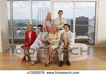 Stock Photo - Portrait of business executives in an office. Fotosearch