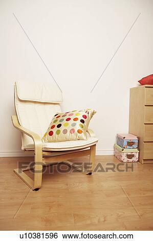 Cushion in an armchair View Large Photo Image Stock Photograph - Cushion in an armchair. Fotosearch