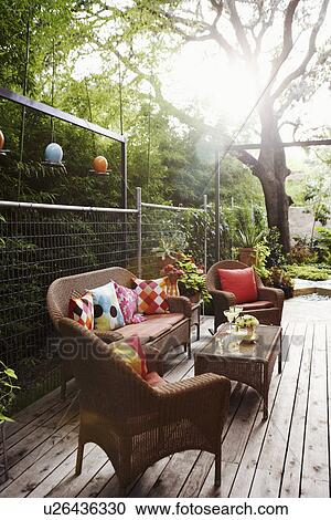 Stock Image - Empty chairs and a table. Fotosearch