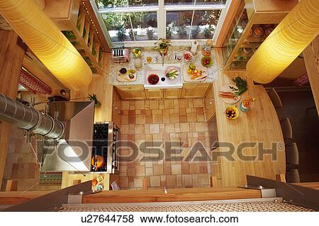 Stock Photo - High angle view of an empty kitchen. Fotosearch