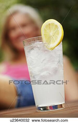 Close-up of a glass of lemonade View Large Photo Image Stock Image - Close-up of a glass of lemonade. Fotosearch