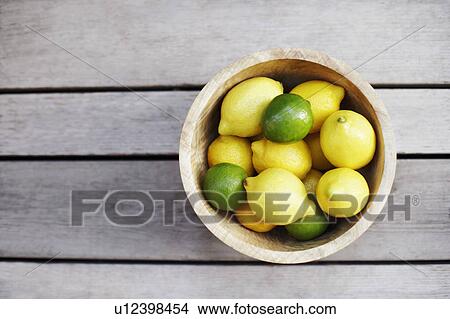 Close-up of lemons in a bowl View Large Photo Image Picture - Close-up of lemons in a bowl. Fotosearch