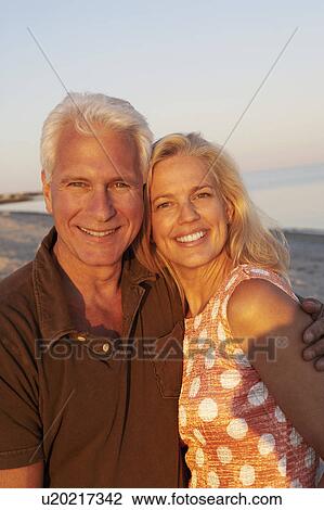 Stock Image - Portrait of a mature couple smiling. Fotosearch