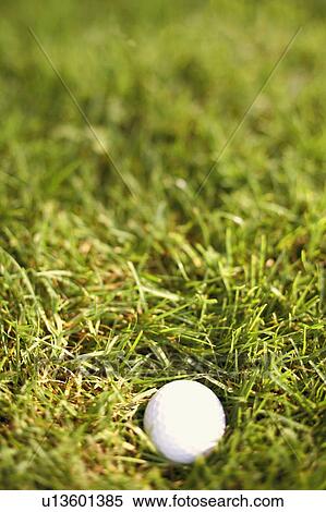 Stock Photography - Close-up of a golf ball. Fotosearch