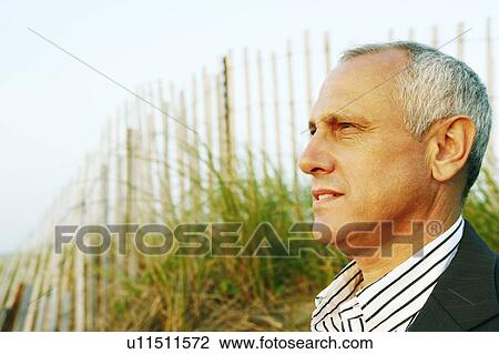 Side profile of a mature man thinking View Large Photo Image Stock Image - Side profile of a mature man thinking. Fotosearch
