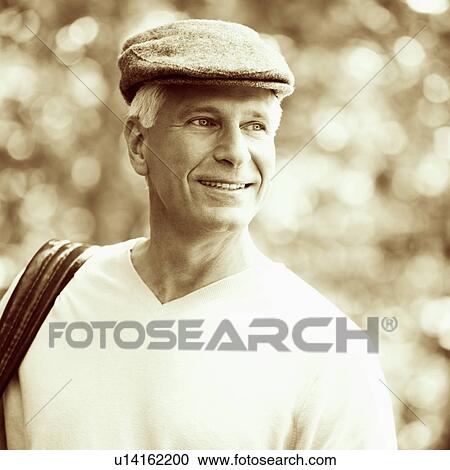 Stock Image - Close-up of a mature man smiling. Fotosearch