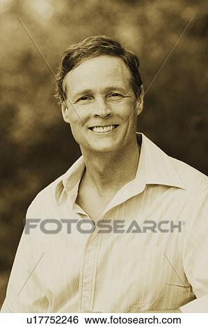 Stock Photograph - Portrait of a mature man smiling. Fotosearch