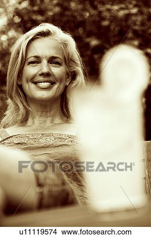 Picture - Portrait of a mature woman smiling. Fotosearch